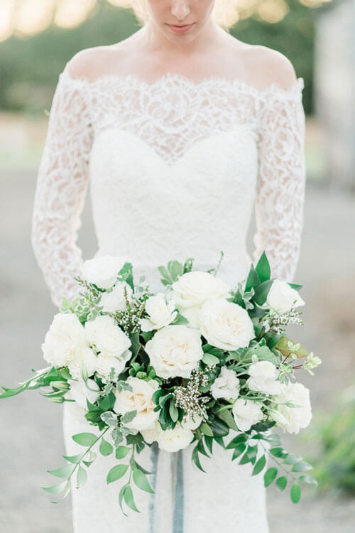 French Countryside Wedding Inspiration Bride holding bouquet