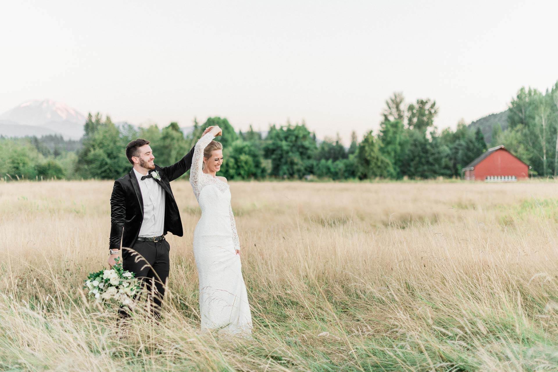 French Countryside Wedding Inspiration Bride and Groom dancing in hayfield