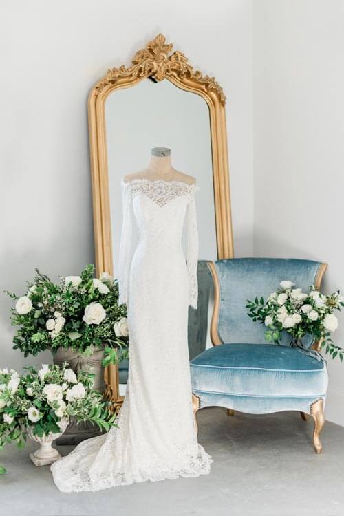 French Countryside Wedding Inspiration gown with gold mirror