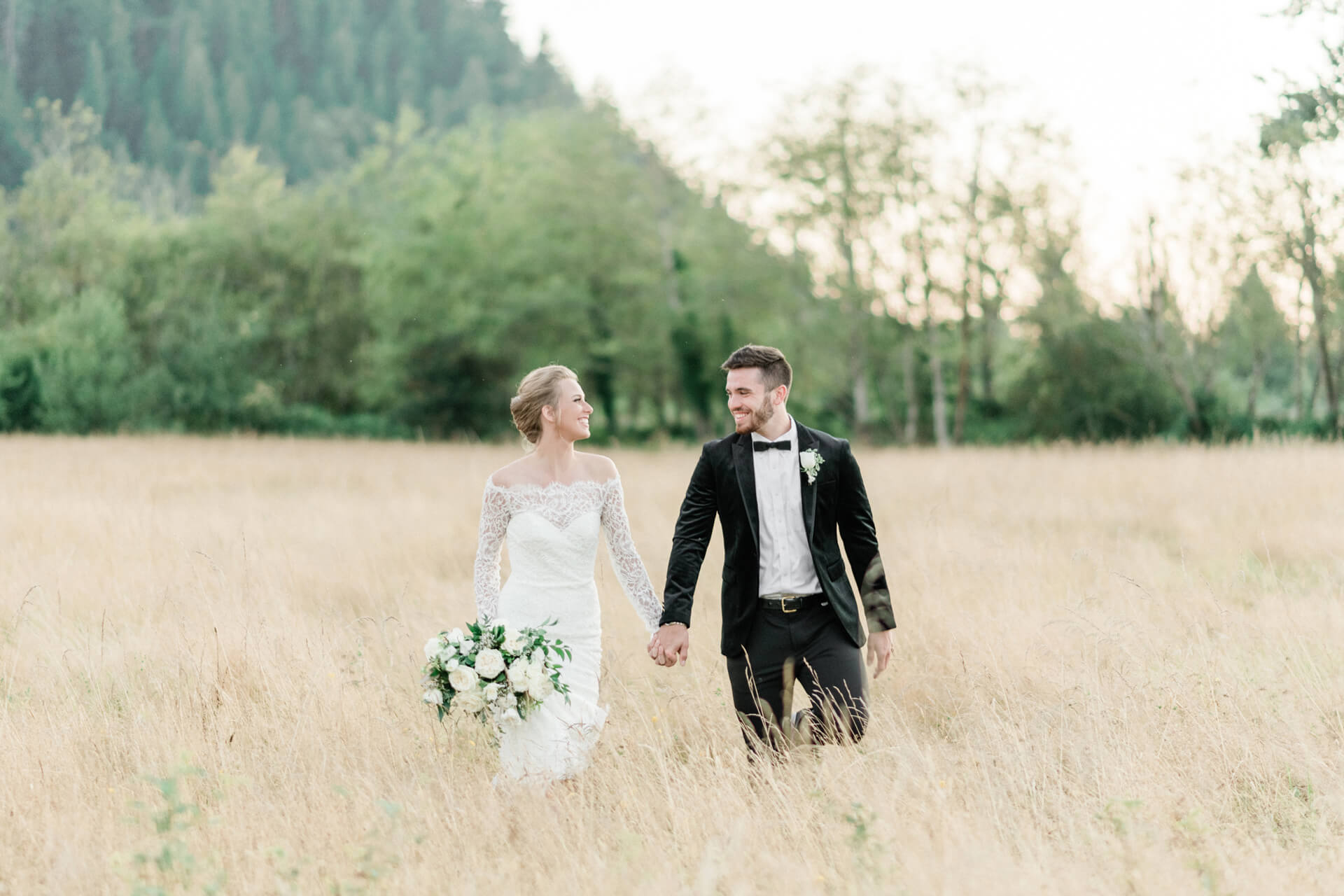 Couple in hayfield at Mount Peak Farm