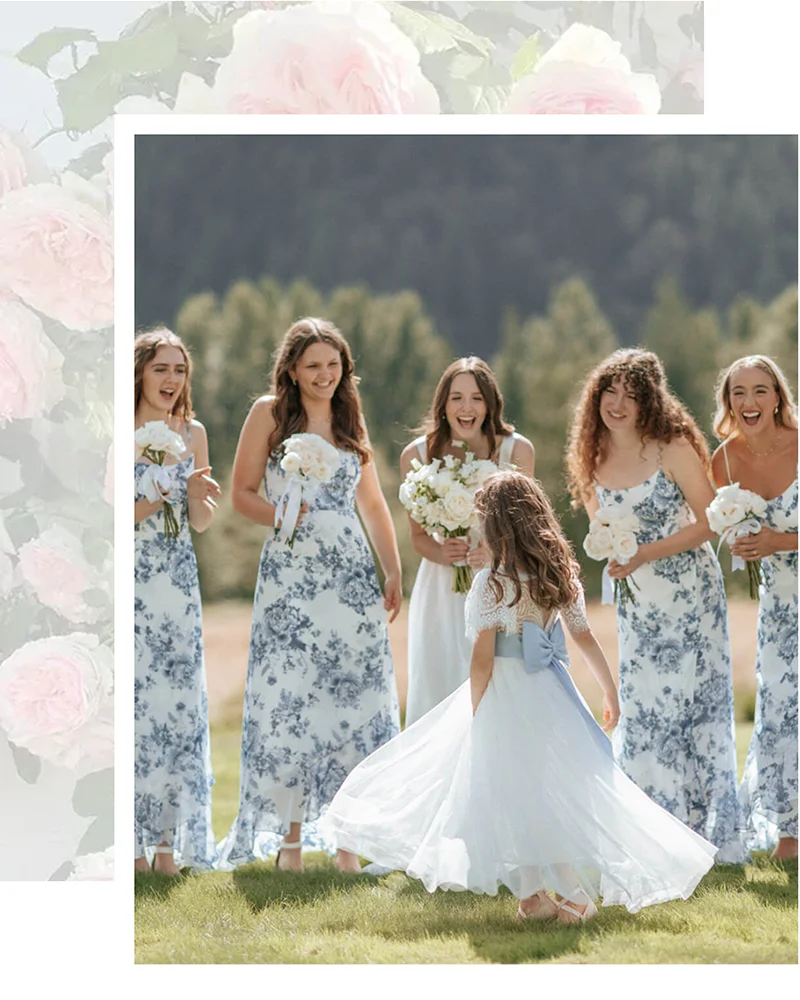 Flowergirl twirls with Bride and bridesmaids in sunshine at Mount Peak Farm wedding venue
