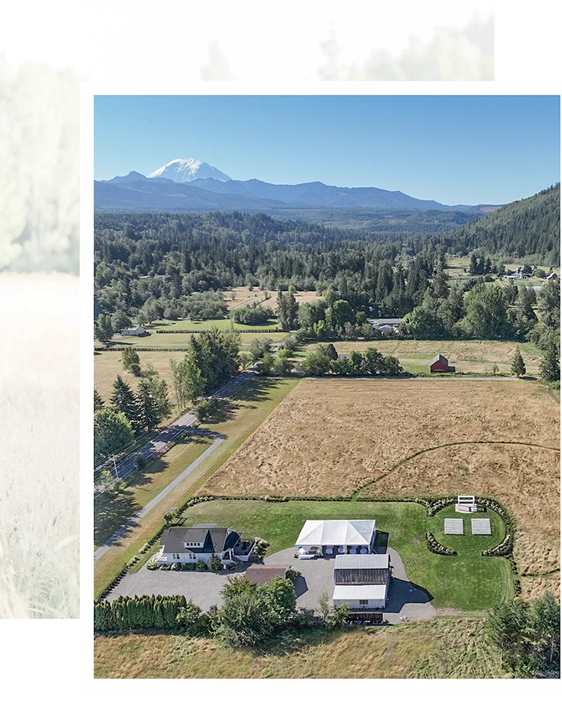 Drone overview of Mount Peak Farm wedding venue. Rural fields and views of Mount Rainier and foothills.