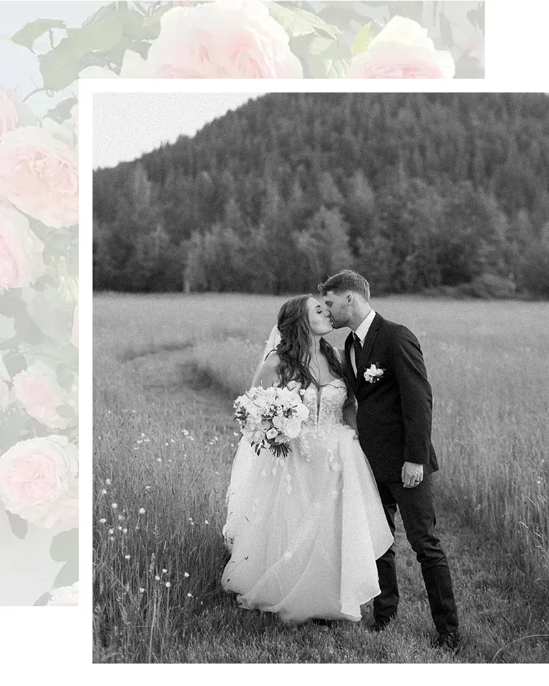 Bride and groom kissing in pathway through hayfield at Mount Peak Farm wedding venue